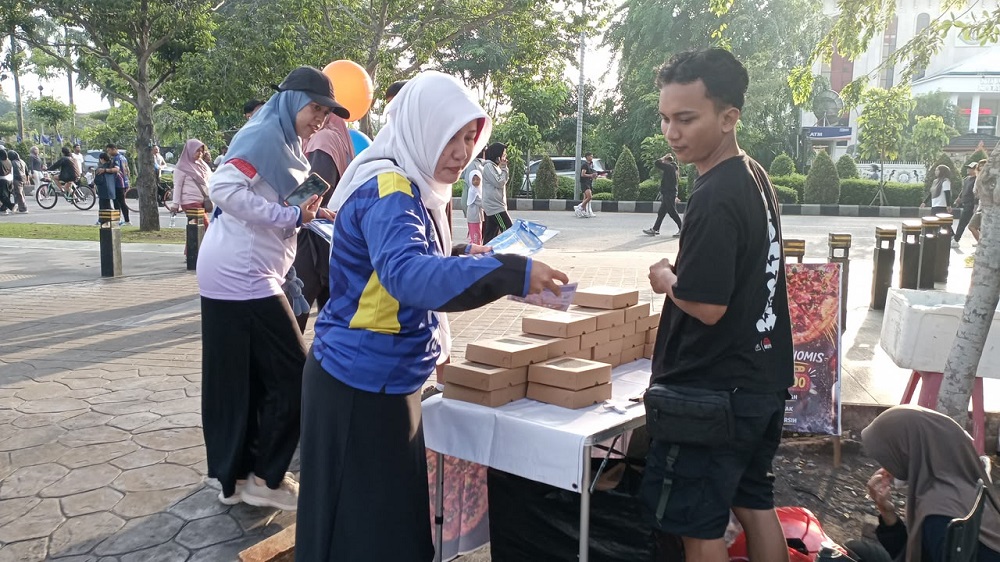 Bapenda dan Diskominfo Pontianak Hadir di CFD, Bayar PBB-P2 via QRIS Dapat Minyak Goreng